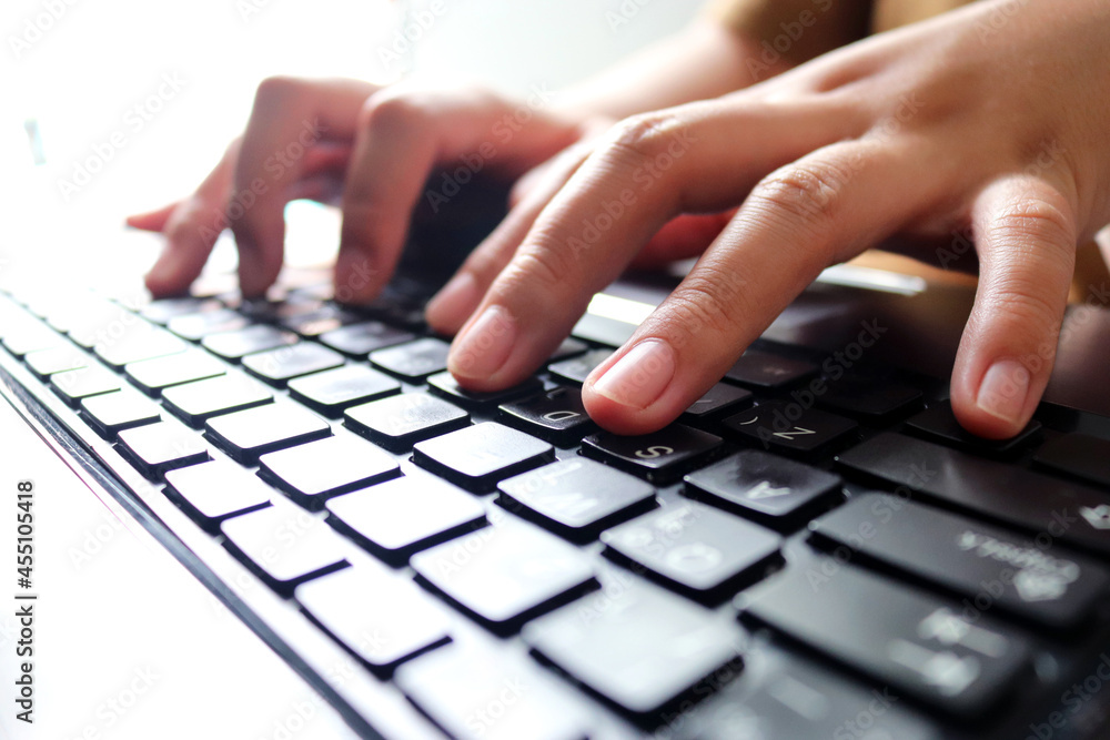 Businesswoman pressing on the keyboard laptop / Customer service evaluation concept. Businesswoman pressing on the keyboard laptop / Customer service evaluation concept.