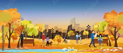Autumn landscapes in city park with sunset, happy people having fun, girl walking the dog,man reading news paper and women sitting on bench reading a book with orange foliage,fall season in the town