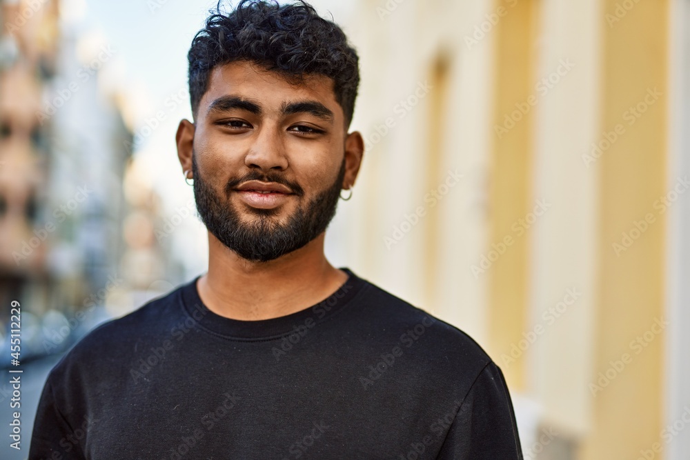 Young arab man smiling confident at street Young arab man smiling confident at street