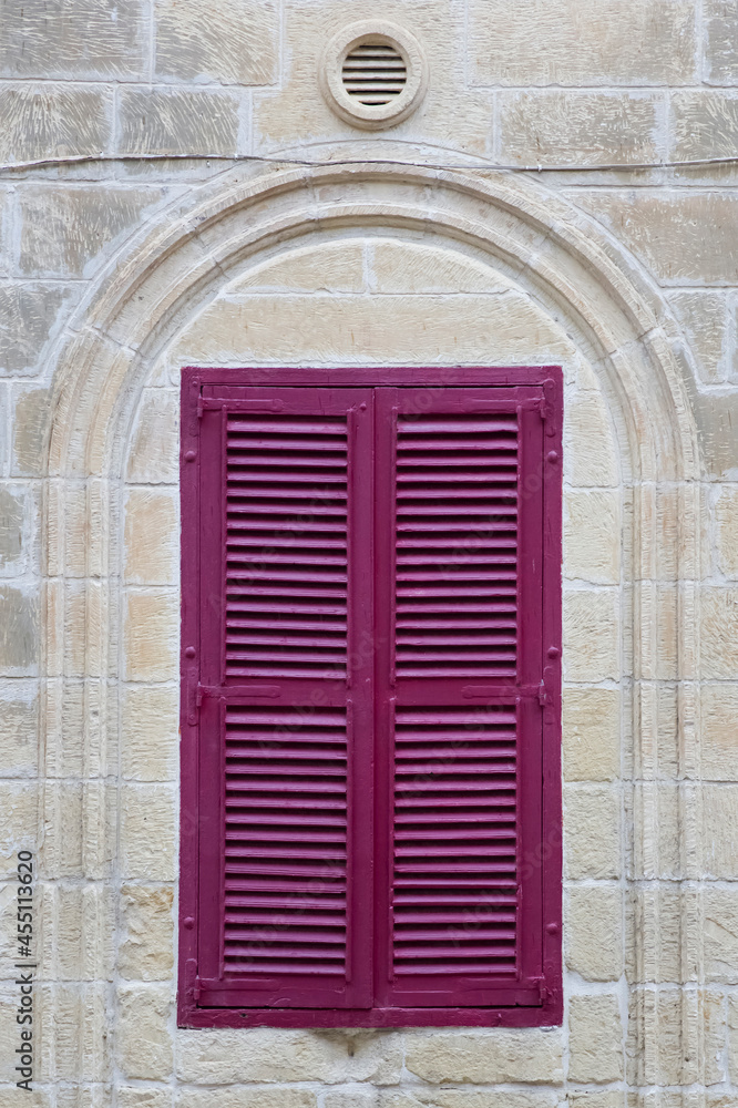 Fototapeta premium Purple shutters on the window at Gozo, Malta