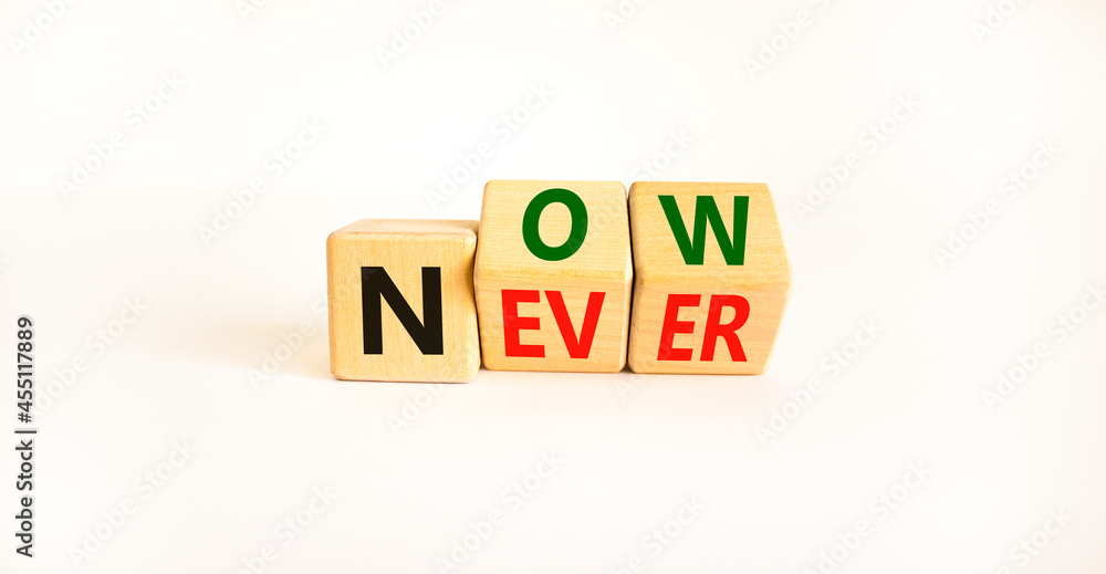 Now or never symbol. Turned wooden cubes and changed the word 'never' to 'now' or vice versa. Beautiful white background, copy space. Business and now or never planning concept. Now or never symbol. Turned wooden cubes and changed the word 'never' to 'now' or vice versa. Beautiful white background, copy space. Business and now or never planning concept.