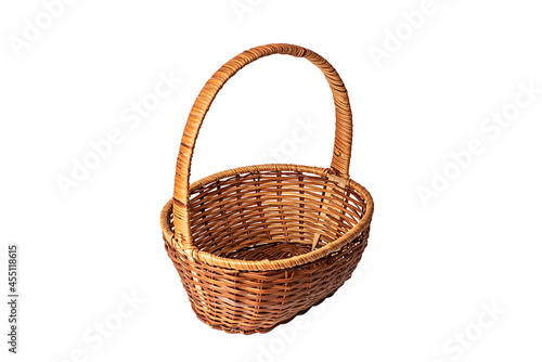 Brown wicker basket. Handmade. On white background.