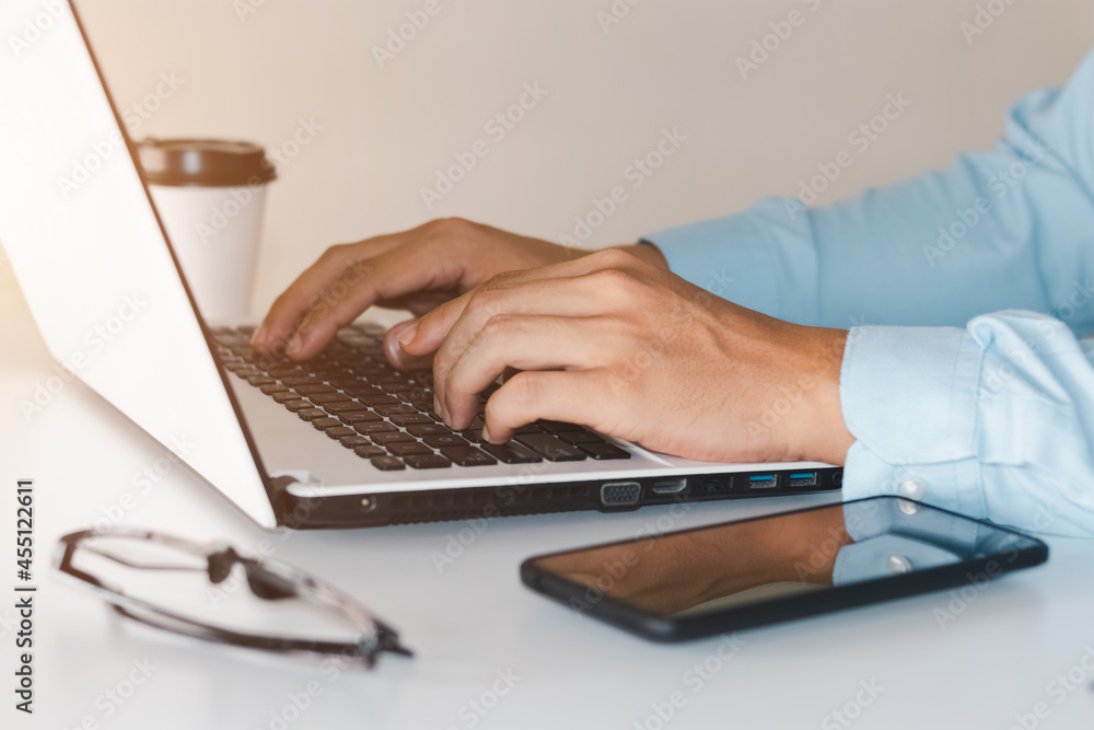 businessmen working at their desks with notebooks taking notes Accepting orders from online customers, online business and e-commerce, Online stores selling products. businessmen working at their desks with notebooks taking notes Accepting orders from online customers, online business and e-commerce, Online stores selling products.