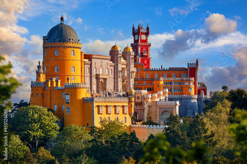 Palace of Pena in Sintra. Lisbon, Portugal. Famous landmark. Summer morning landscape with blue sky. #455126085
