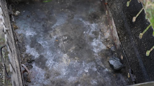 Wallpaper Mural Close-up top view slow motion 4k video footage of bbq pit and black organic charcoal falling down into pit ready to cook food outdoors during picnic getaway Torontodigital.ca