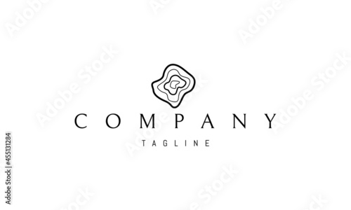 Vector logo on which an abstract image of a cut of a tree.