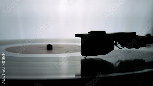spinning record player with vintage vinyl turntable player and vinyl