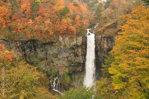 View of Kegon Falls in autumn (October 2019) with trees full of colorful leaves, located at Lake Chūzenji (source of the Oshiri River) in Nikkō National Park near the city of Nikkō, Tochigi, Japan