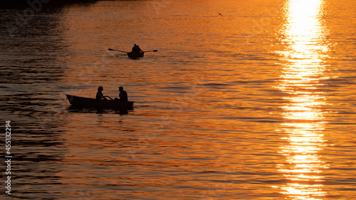 Wallpaper Mural people sailing on boats on the river at sunset Torontodigital.ca