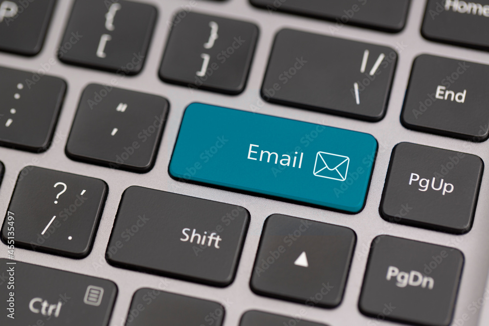 Button with the word email on a keyboard. Communication on internet globally concept. Button with the word email on a keyboard. Communication on internet globally concept.