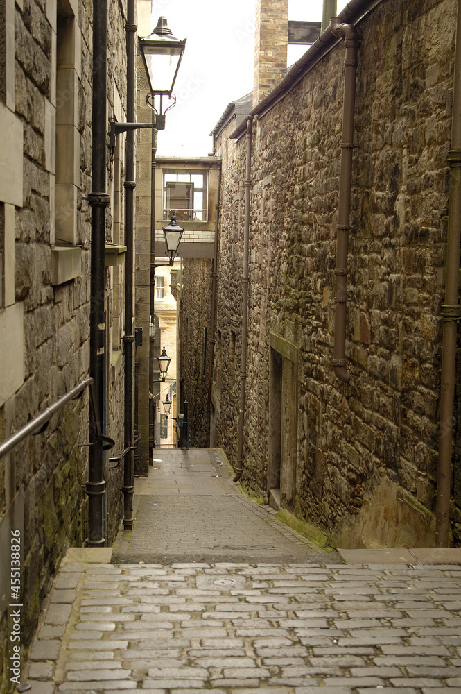 old historic narrow close and lamps in Edinburgh