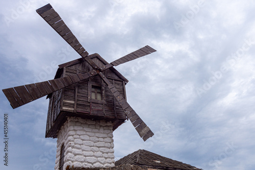 old wooden windmill in the sky