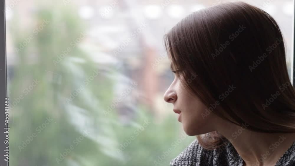 teen abuse,teenager has depression,a young girl is unhappy,upset, looks out the window teen abuse,teenager has depression,a young girl is unhappy,upset, looks out the window