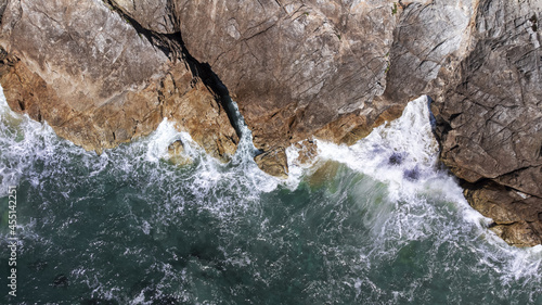Beach with rock photo by Drone in French