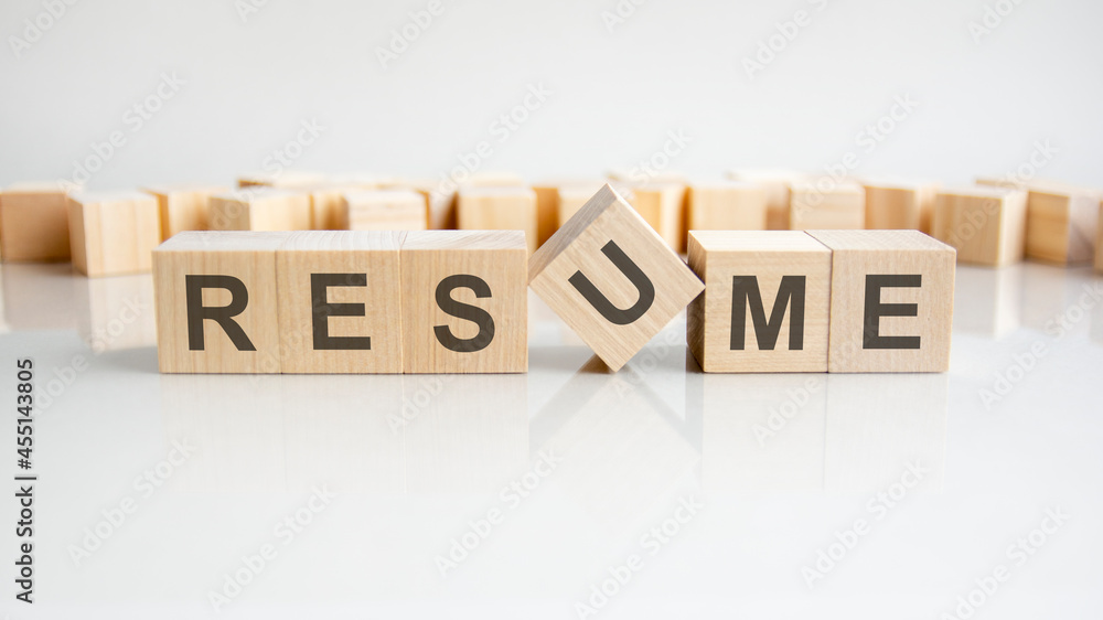 brand text on a wooden blocks, gray background. brand text on a wooden blocks, gray background.