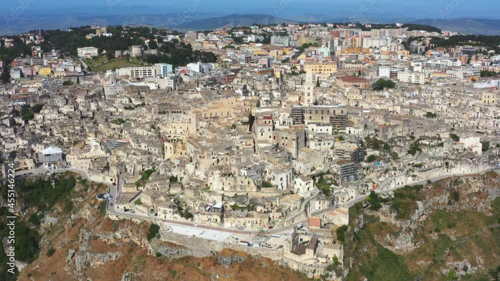 Aerial view of Matera, the city of stones in Basilicata. Houses roads and an ancient landscape and European capital of culture
Aerial view of Matera, the city of stones in Basilicata. Houses roads and an ancient landscape and European capital of culture