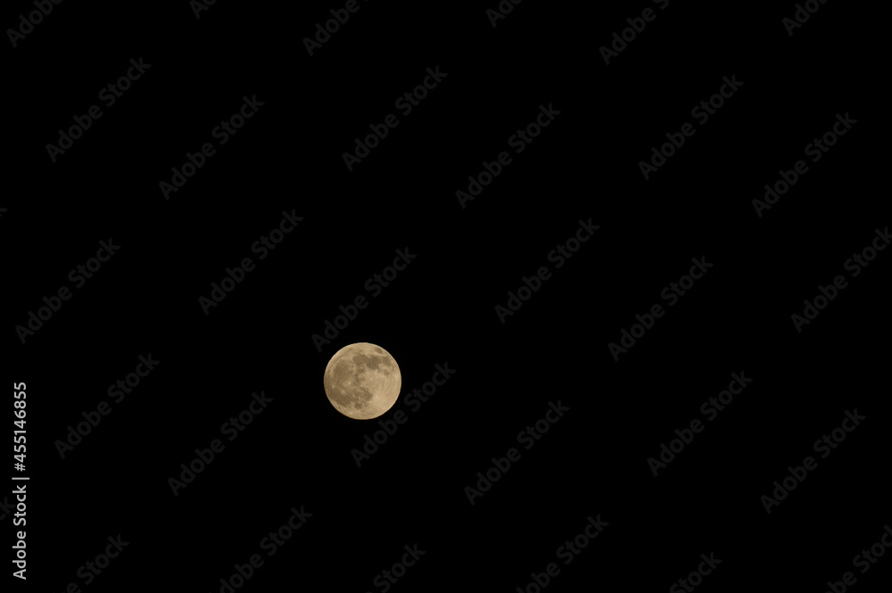 Dark and almost black sky with a bright moon. Dark and almost black sky with a bright moon.