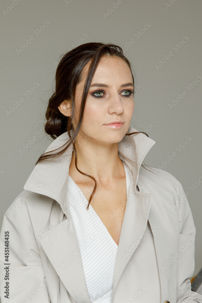 Young woman with smoky eyes makeup in studio in studio Young woman with smoky eyes makeup in studio in studio