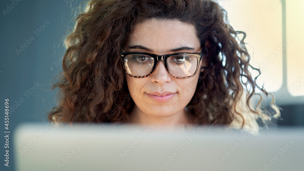 Woman working with laptop computer Woman working with laptop computer