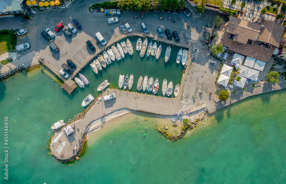 Aerial view of a small port of a Sirmione town in Garda lake, Italy