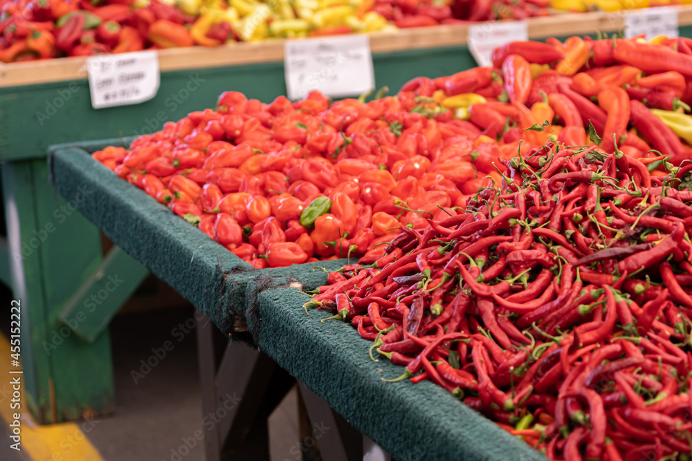 fresh organic Chilli Peppers on display at a farmers market