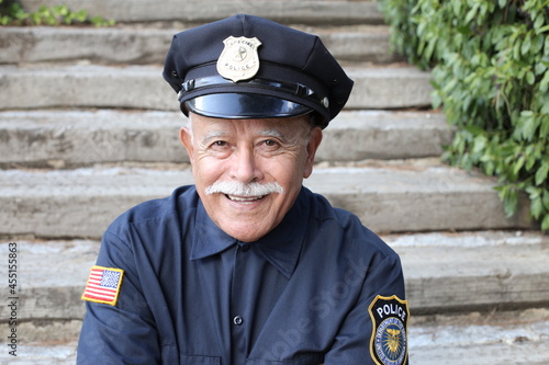 Billede på lærred Veteran police officer with a mustache