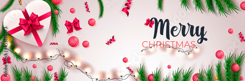 Merry Christmas 2022 banner. Holiday concept with festive decor on white background. Xmas poster with gift, bows, pine, balls, ribbons. Vector illustration with realistic elements for header website