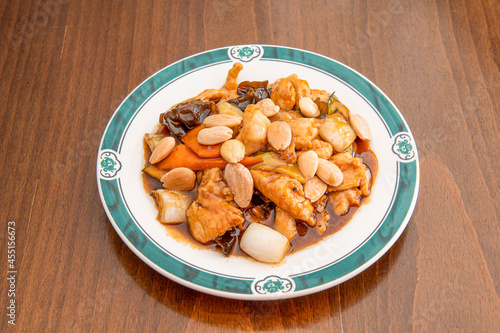 Chicken stew with whole almonds, wok-stewed carrots and onions and rehydrated Chinese mushrooms with soy sauce