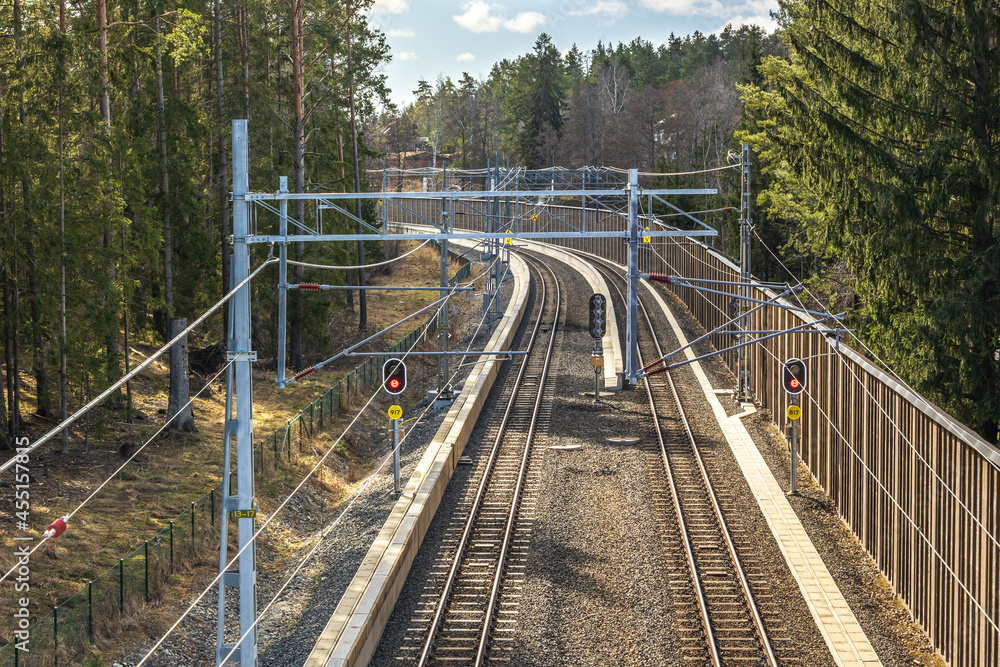 Stockholm, Sweden - Apr, 10th 2021: a narrow gauge urban railway system in Roslagen, Roslagsbanan Stockholm, Sweden - Apr, 10th 2021: a narrow gauge urban railway system in Roslagen, Roslagsbanan