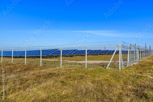 Many solar panels in a field. Clean energy. Ecological concept