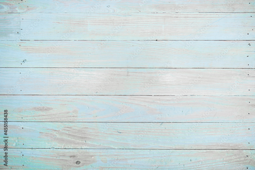 Fototapeta premium Blue green light pastel wood painted background with worn texture