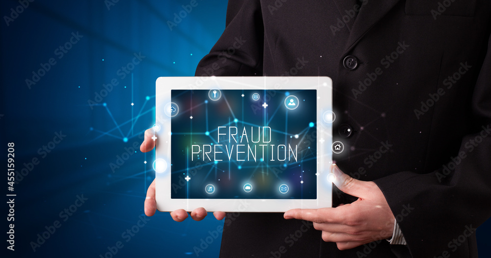 Person holding tablet, security concept Person holding tablet, security concept