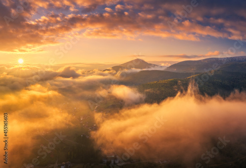 Mountains in low clouds at ...