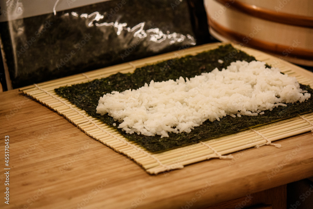 Homemade cucumber sushi roll preparation – in progress 