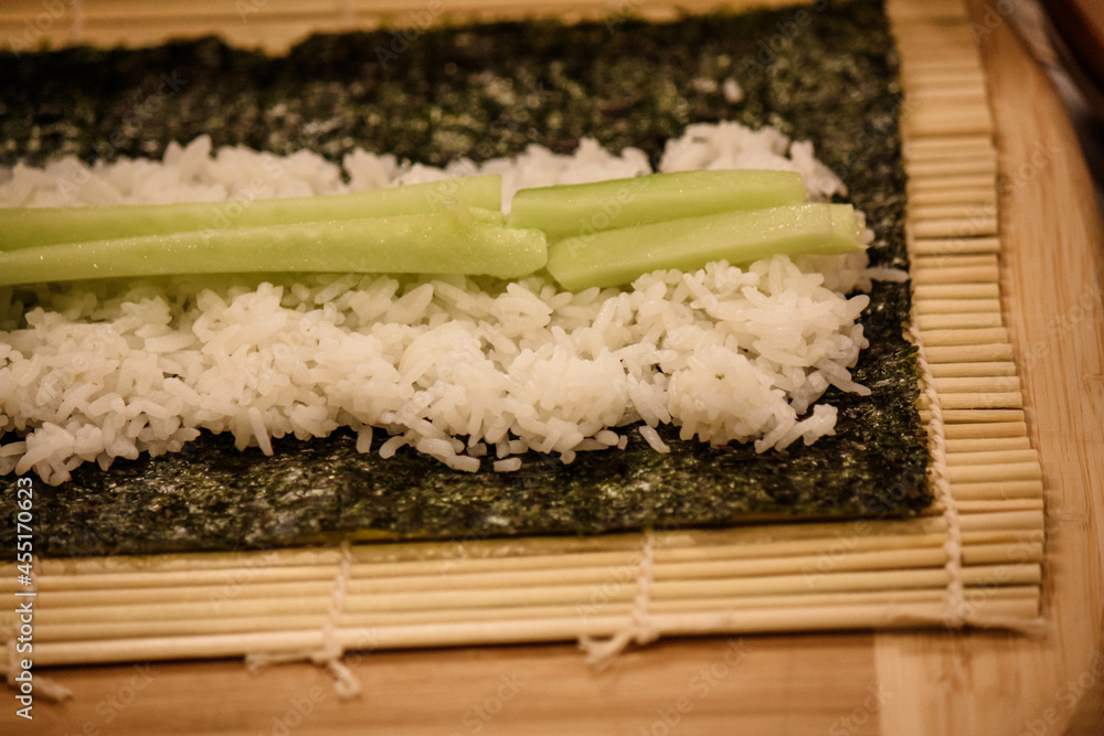 Cucumber sushi roll preparation – in progress Cucumber sushi roll preparation – in progress