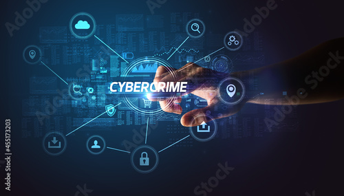 Hand touching cybersecurity button concept