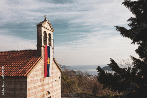 Serbian flag on the wall of the church photo