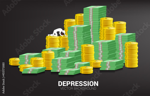 silhouette of businessman crawling on banknote an coin stack. Concept for depression business in work.