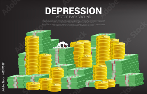 silhouette of businessman crawling on banknote an coin stack. Concept for depression business in work.