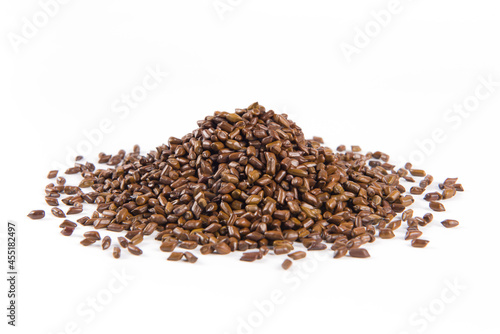 Chinese herbal medicine cassia seeds on white background