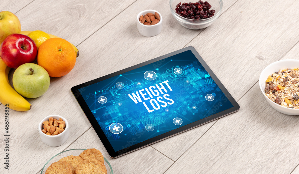Tablet Pc with fruits, healthy concept Tablet Pc with fruits, healthy concept