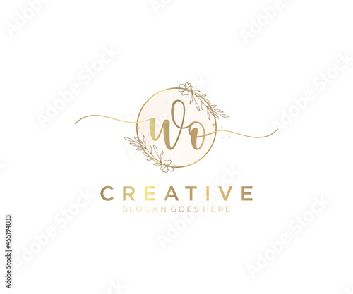 initial WO Feminine logo beauty monogram and elegant logo design, handwriting logo of initial signature, wedding, fashion, floral and botanical with creative template.