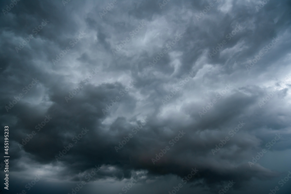 dark storm clouds with background,Dark clouds before a thunder-storm. dark storm clouds with background,Dark clouds before a thunder-storm.