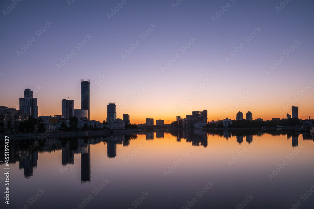 Sunset on a pond in the center of the city. Yekaterinburg, Russia