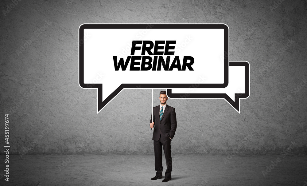 business person in casual holding road sign