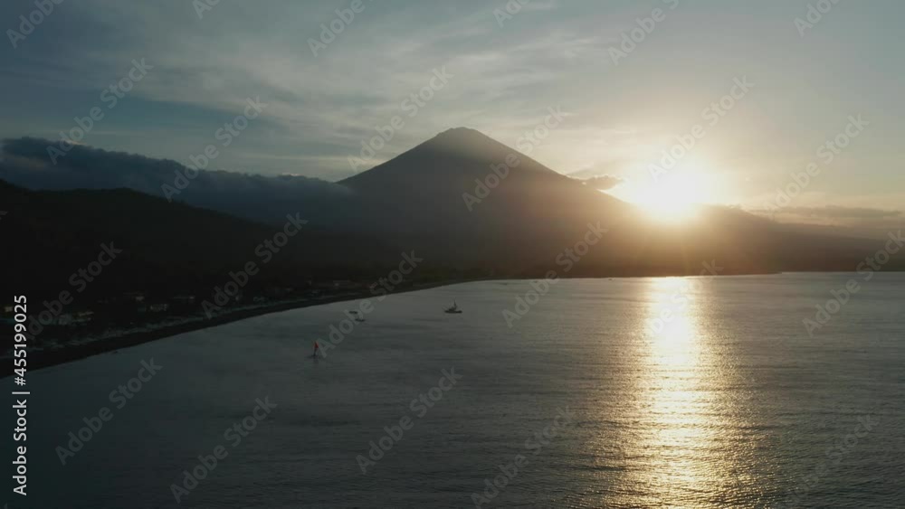 Silhouette of Mount Agung volcano during sunset, Bali shore, aerial Silhouette of Mount Agung volcano during sunset, Bali shore, aerial