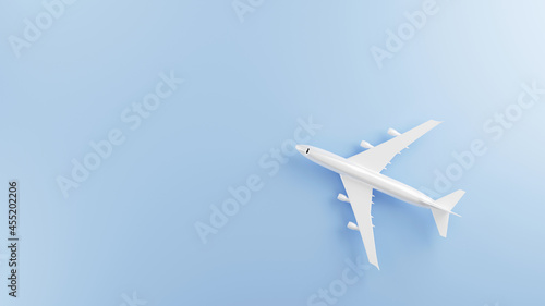 Model airplane top view flat lay design of travel plane on blue background, air transportation, tourism summer concept with copy space, 3D rendering illustration