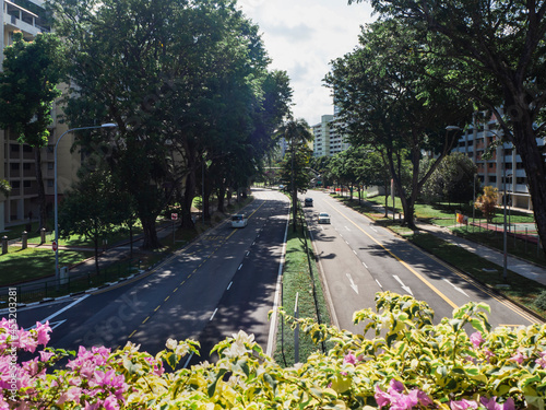 Photography View of the traffic on the roads from an overhead bridge in a residential neighb
