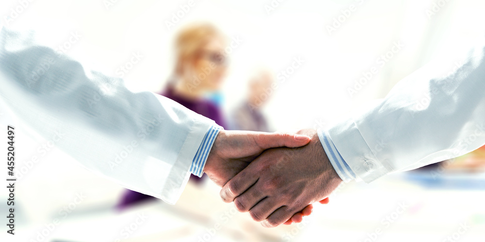 Partnership concept. Image of handshake . Mixed media Partnership concept. Image of handshake . Mixed media