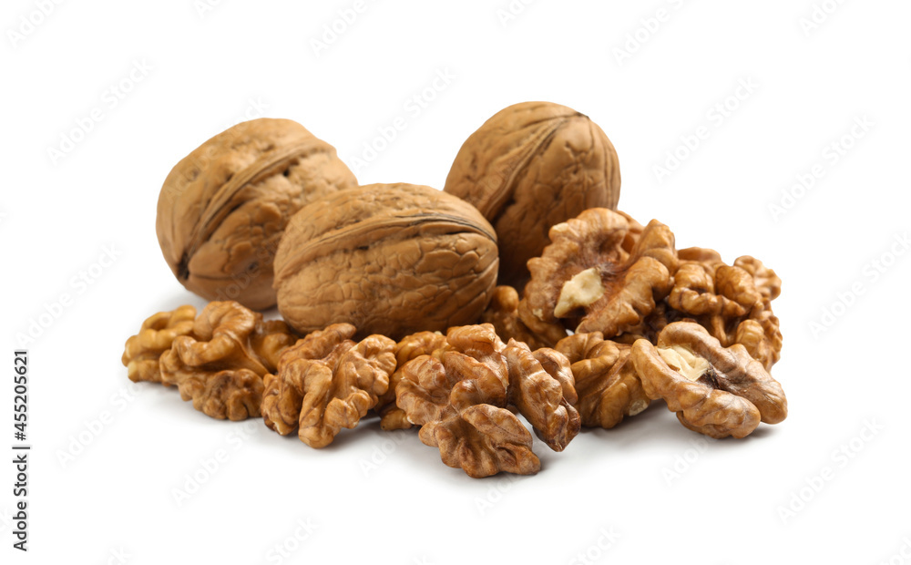 Pile of ripe walnuts on white background Pile of ripe walnuts on white background